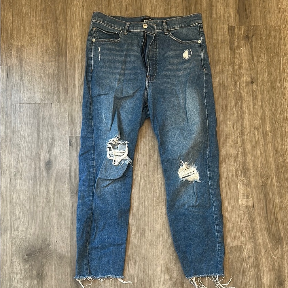 Women's Distressed Blue Jeans